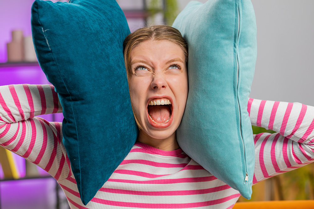 Covering ears because of noisy neighbours