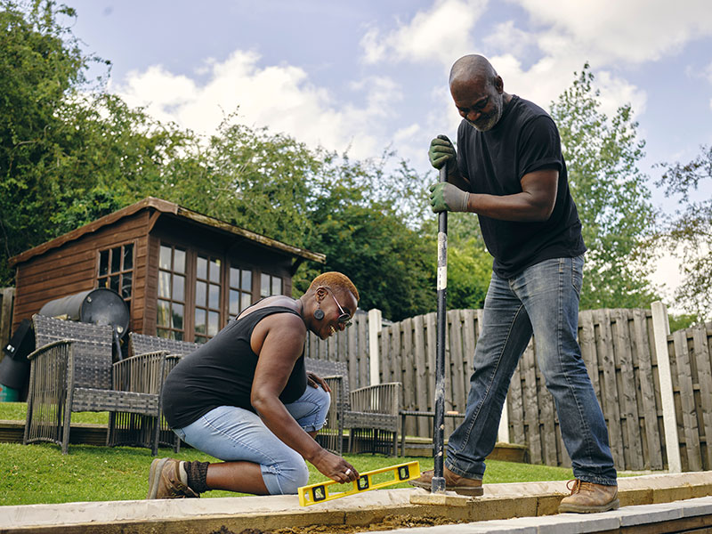 Couple building a DIY fence